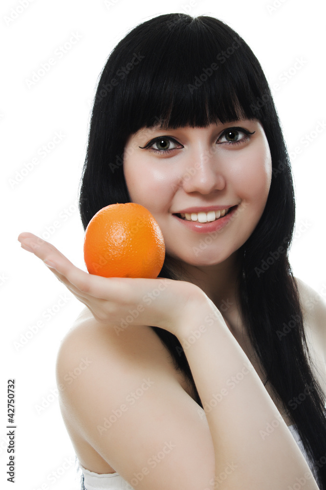 Portrait of a beautiful woman, holding an orange Portrait of a beautiful woman, holding an orange