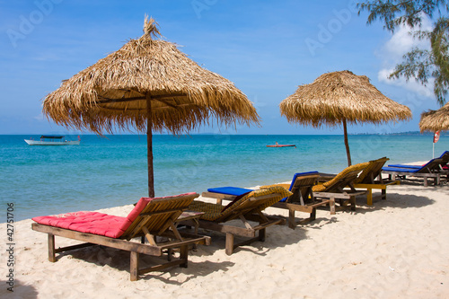 Sun loungers with an umbrella