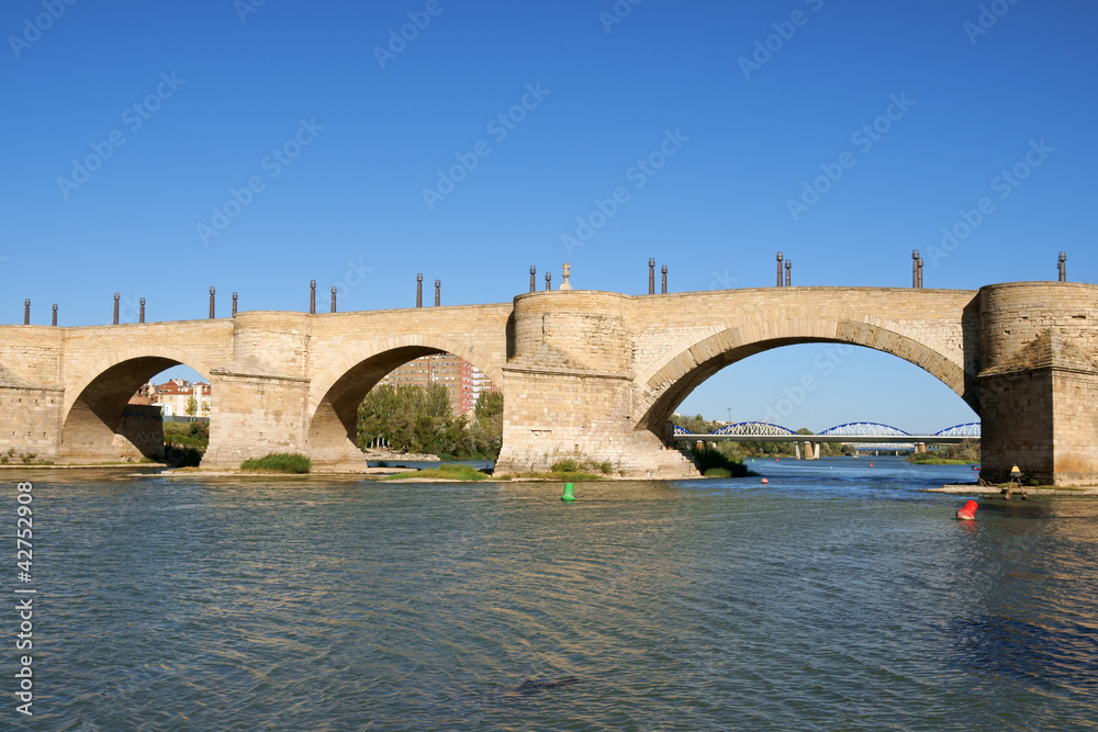 Stone Bridge (Puente de Piedra) over river Ebro in Zaragoza, Spa