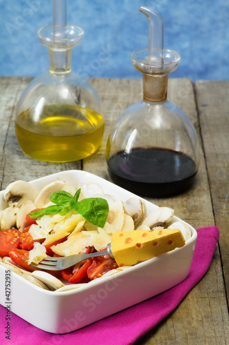 healthy salad wih ingredients and seasoning
