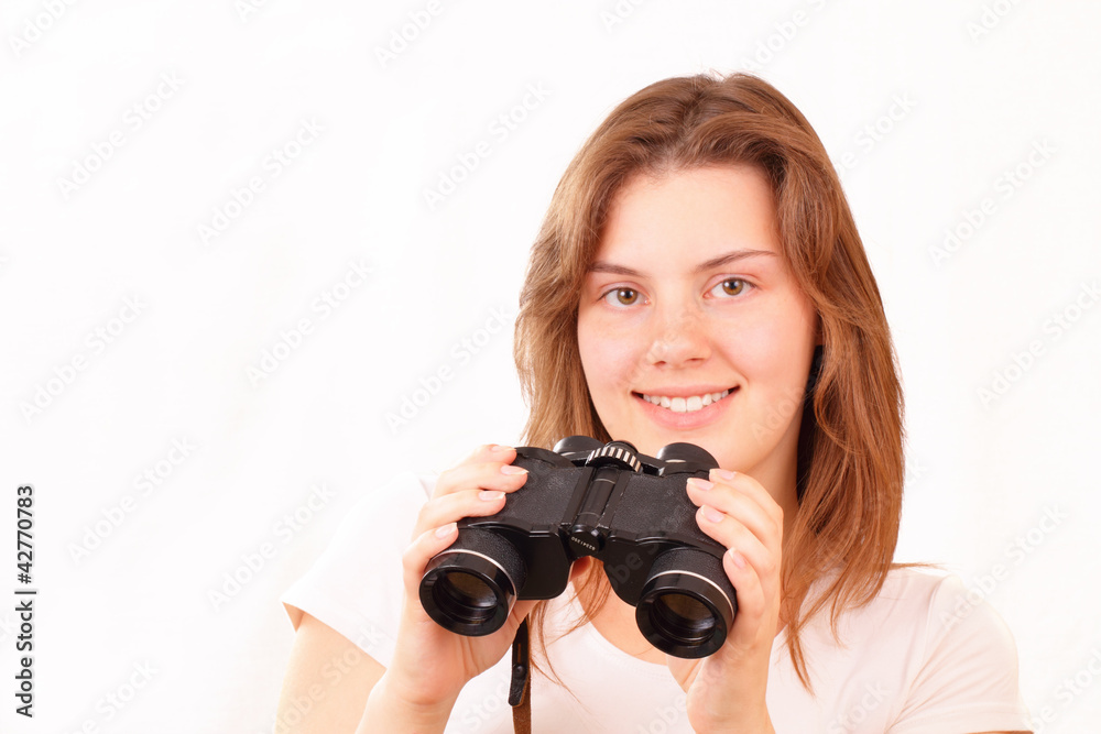 Smiling young girl with binoculars Smiling young girl with binoculars