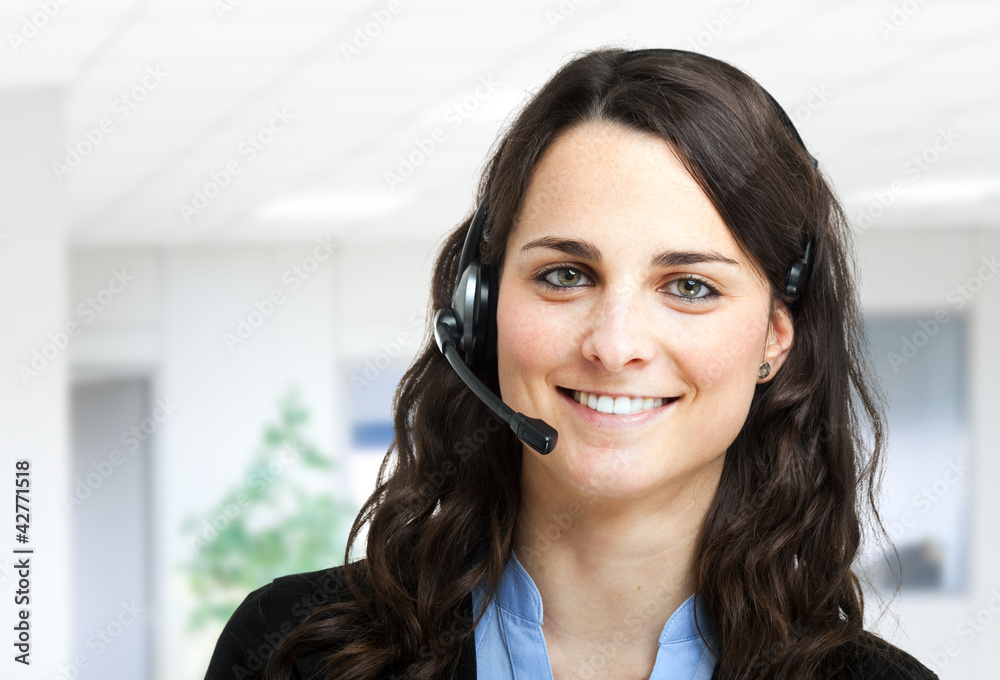 Beautiful customer representative at work Beautiful customer representative at work