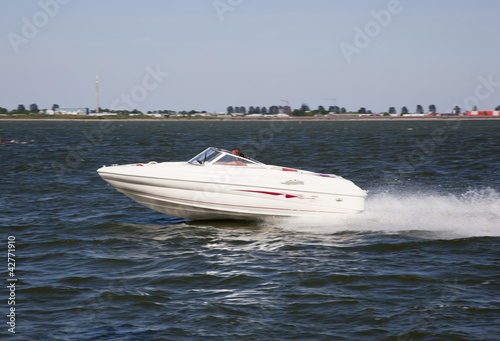 fast speedboat on the lake, the netherlands