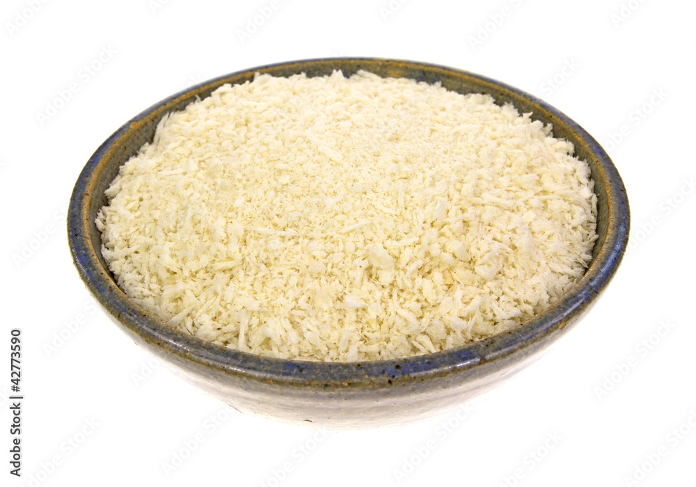 Bowl of panko flaked bread crumbs Bowl of panko flaked bread crumbs