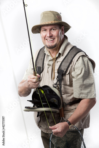 Fly fisherman ready for catching trout.