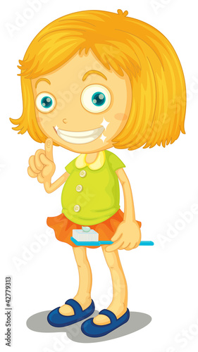 a girl brushing teeth