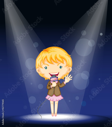 a girl performing on stage