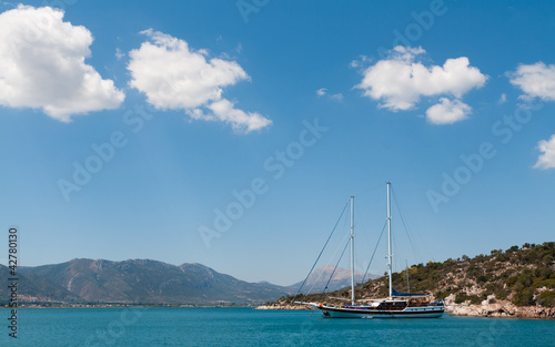 Yacht sailing Greek island Poros