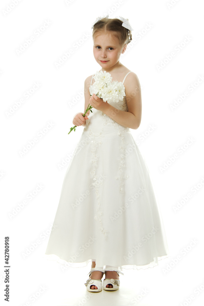 Beautiful girl in white dress with a flower Beautiful girl in white dress with a flower
