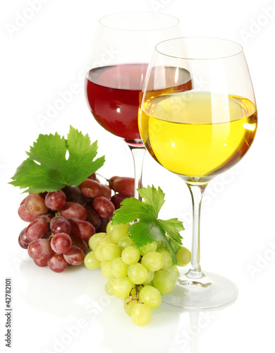 glasses of wine and ripe grapes isolated on white