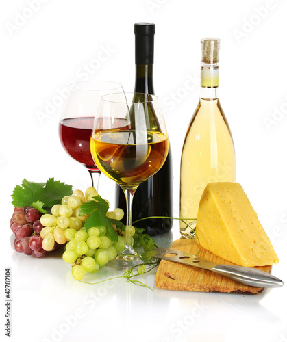 Fototapeta Naklejka Na Ścianę i Meble -  bottles and glasses of wine, cheese and ripe grapes isolated