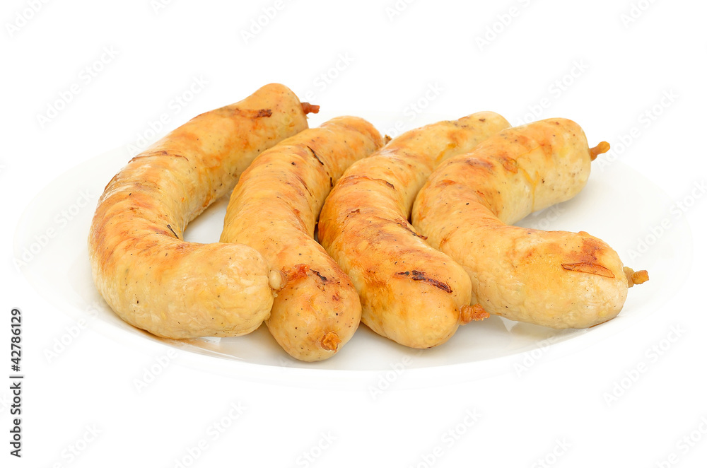 Grilled chicken sausages isolated on white background Grilled chicken sausages isolated on white background