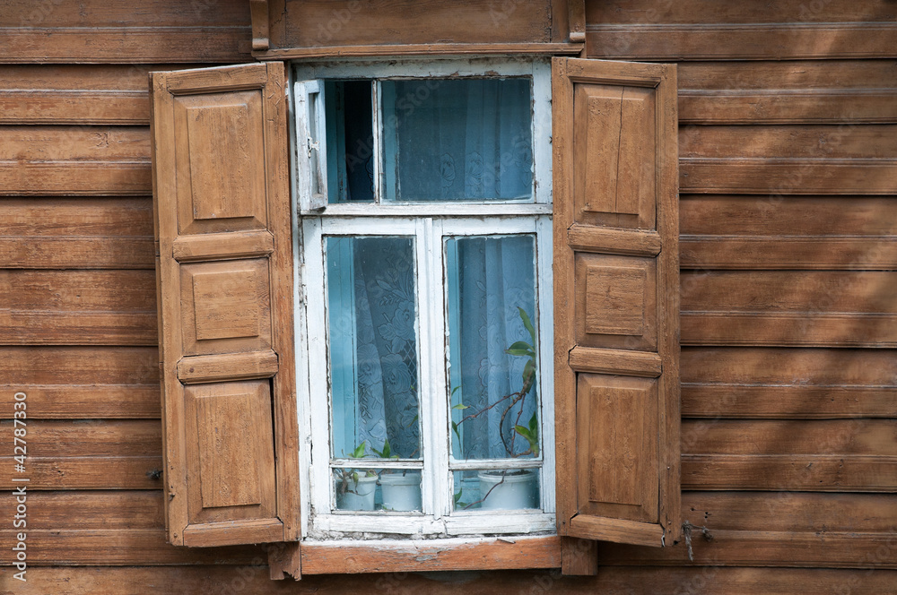 Window of old wooden house.