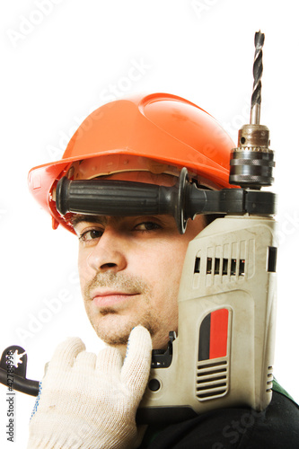 Male worker with an electric dril