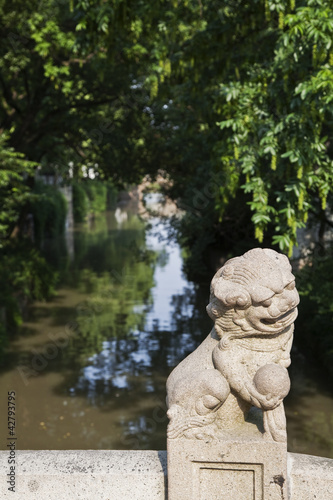 lion in Chinese garden © enrico113