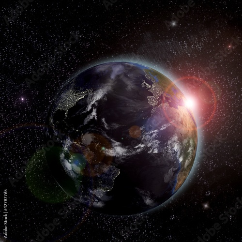 Fototapeta Naklejka Na Ścianę i Meble -  Sunrise over the Earth. Elements of this image furnished by NASA