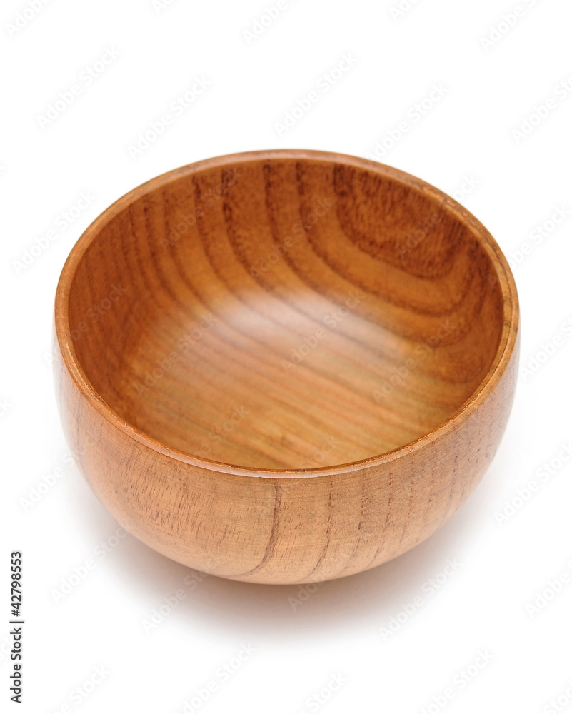 Old wooden bowl on a white background Old wooden bowl on a white background