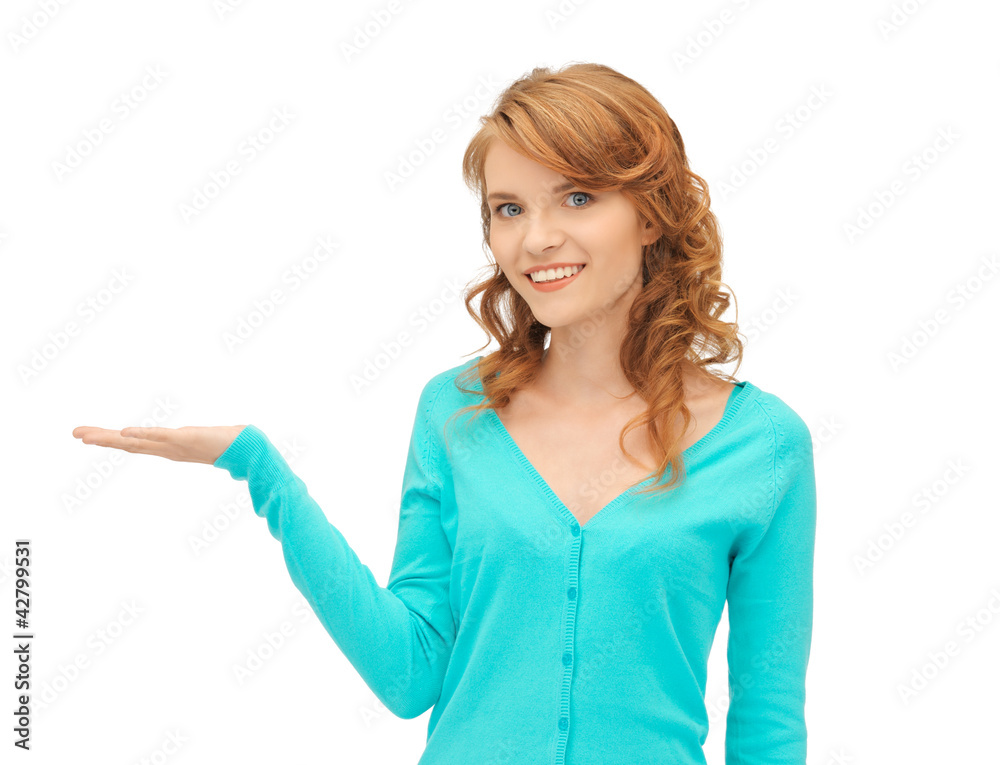 girl showing something on the palm of her hand girl showing something on the palm of her hand