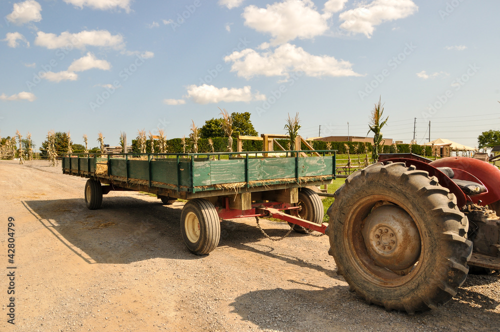 Fototapeta premium Hay wagon and tractor