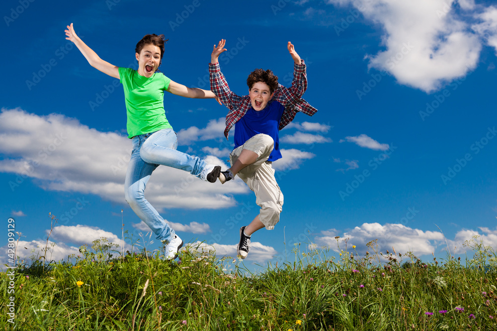 Girl and boy running, jumping outdoor Girl and boy running, jumping outdoor