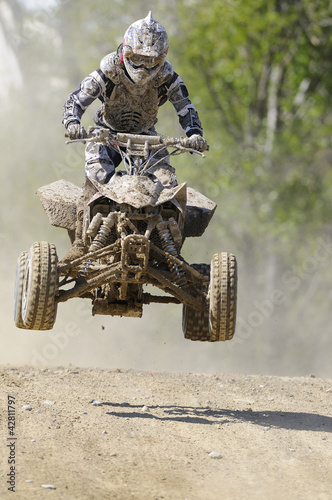 quad jump dusty road