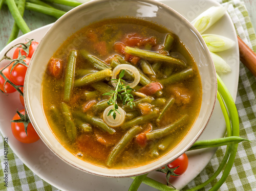 soup with green beans onions and tomatoes, vegetarian food