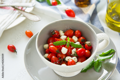 Caprese Salad [Pearl mozzarella ,cherry tomato salad]