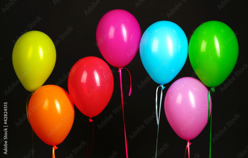 colorful balloons isolated on black background colorful balloons isolated on black background