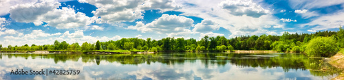Fototapeta Naklejka Na Ścianę i Meble -  Clouds reflection on lake.