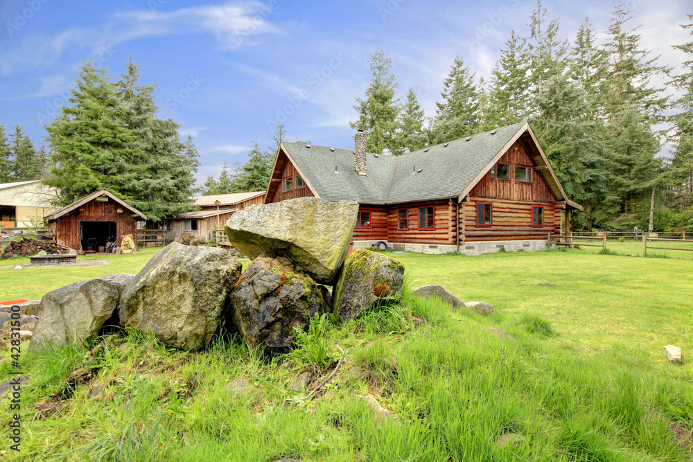 Classic old log cabin house in the country side. Classic old log cabin house in the country side.