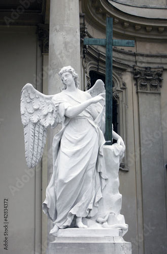 Photography Angel in front of Karlskirche church in Vienna, Austria
