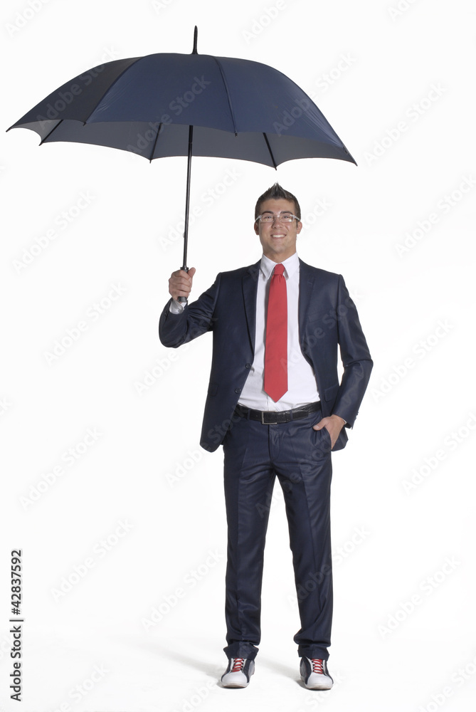 Joven ejecutivo sujetando una sombrilla,paraguas. Stock Photo | Adobe Stock