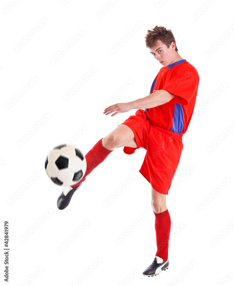 Soccer player shooting a ball