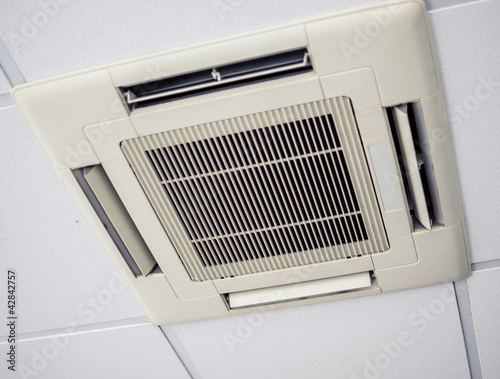 Modern air conditioning system installed on the ceiling