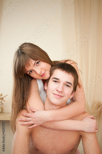Portrait of cosy couple relaxing in bedroom - Indoor