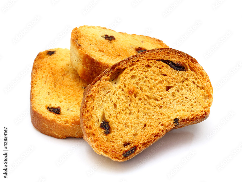 group of sweet tasty rusks with raisins isolated on white backgr group of sweet tasty rusks with raisins isolated on white backgr