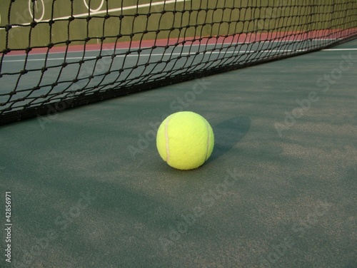 Tennis ball on the Tennis Court © flik47