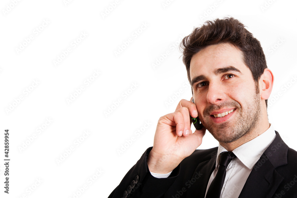 young business man talking on the phone, isolated on white young business man talking on the phone, isolated on white