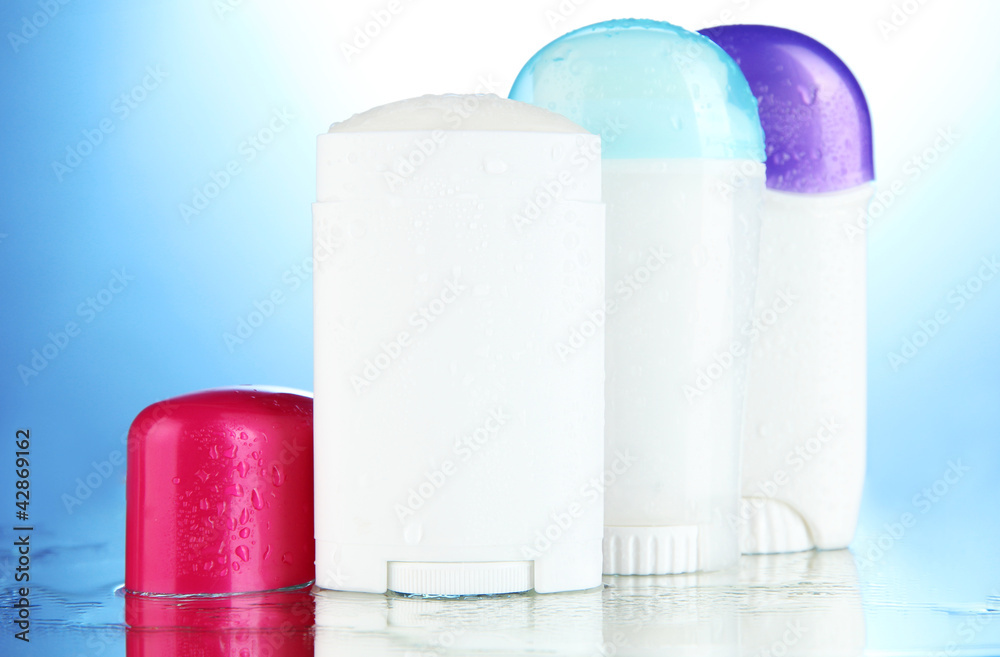 deodorant on blue background
