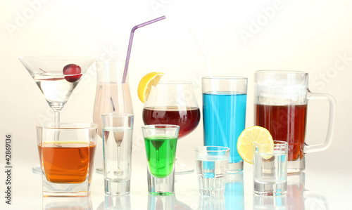 a variety of alcoholic drinks isolated on white