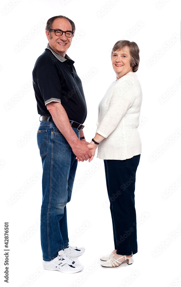 Love couple holding hands. Full length shot Love couple holding hands. Full length shot