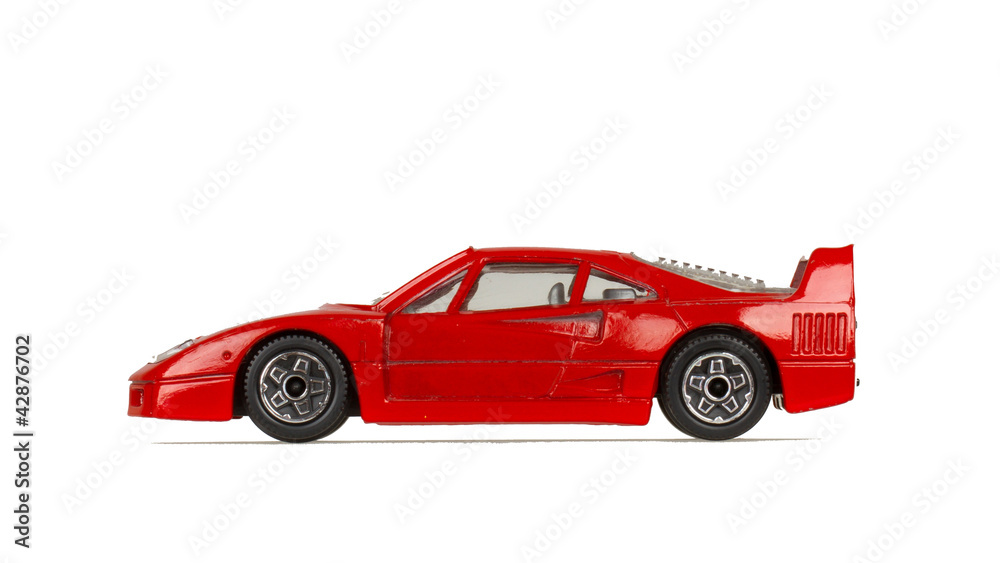 One toy cars, red sportscar, isolated on white