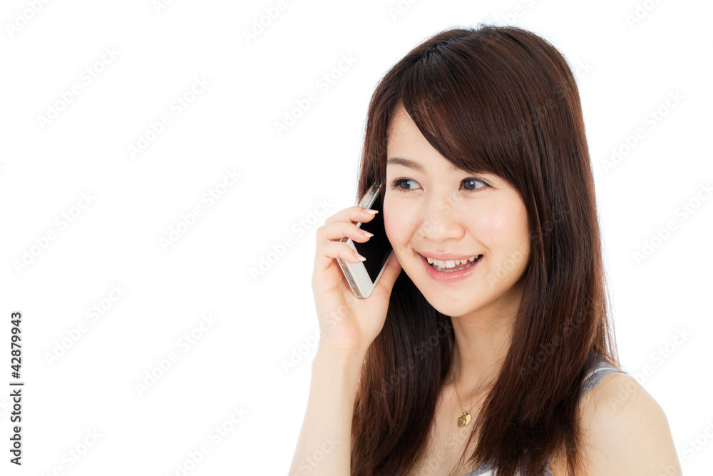 Beautiful young woman using a mobile phone Beautiful young woman using a mobile phone