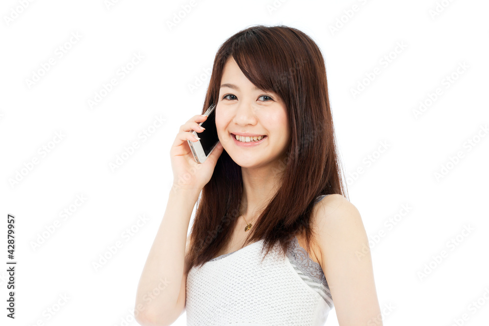 Beautiful young woman using a mobile phone Beautiful young woman using a mobile phone