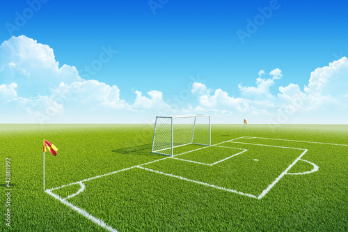 Football (soccer) goal, penalty and corner flag on playgorund