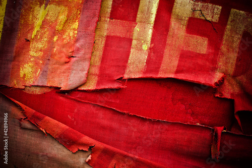 Fotografie Old torn communistic flag