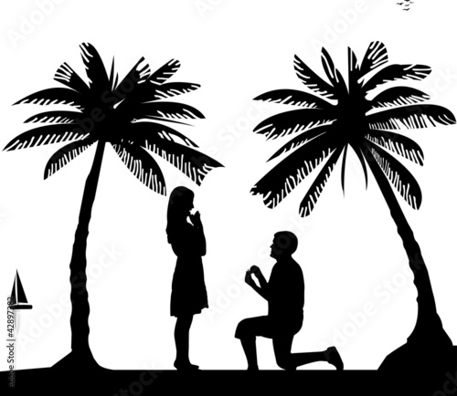 Romantic proposal on seacoast between the palms on the beach