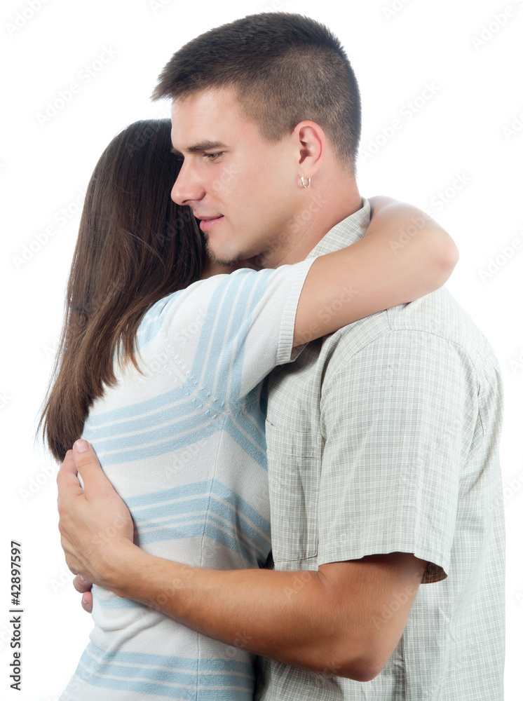 Man consoling his girlfriend isolated on white Man consoling his girlfriend isolated on white