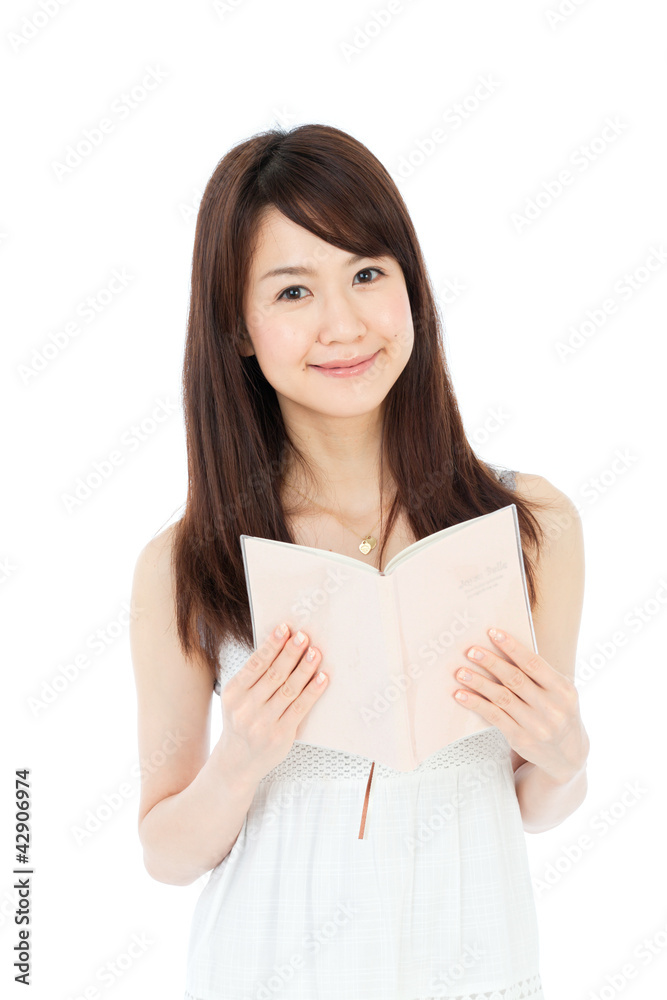 Beautiful young woman reading a book. Portrait of asian. Beautiful young woman reading a book. Portrait of asian.