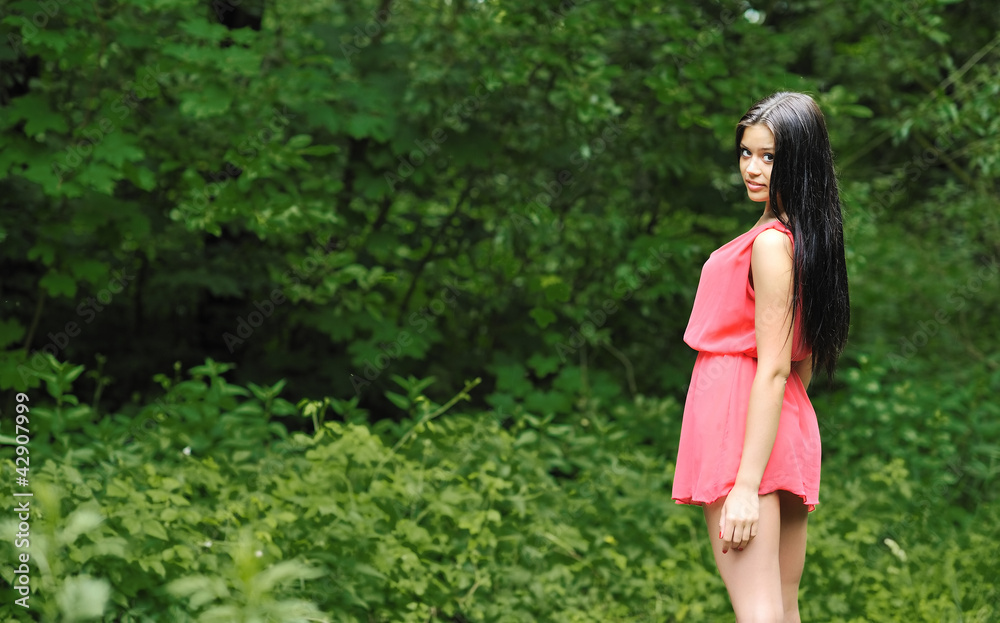 Beautiful girl in a park - lots of copyspace Beautiful girl in a park - lots of copyspace